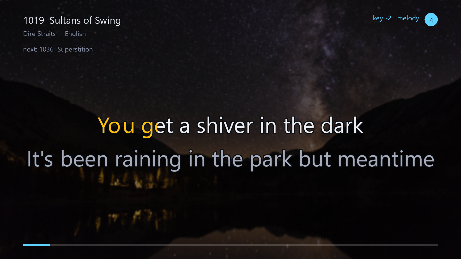 The playing screen on a television: the song's number, title and artist across the top
              with key and melody badges and a disc in the corner counting the songs waiting, the
              line being sung in large letters with the current syllable half-filled in amber, the
              line that follows it below in gray, and a progress bar along the bottom