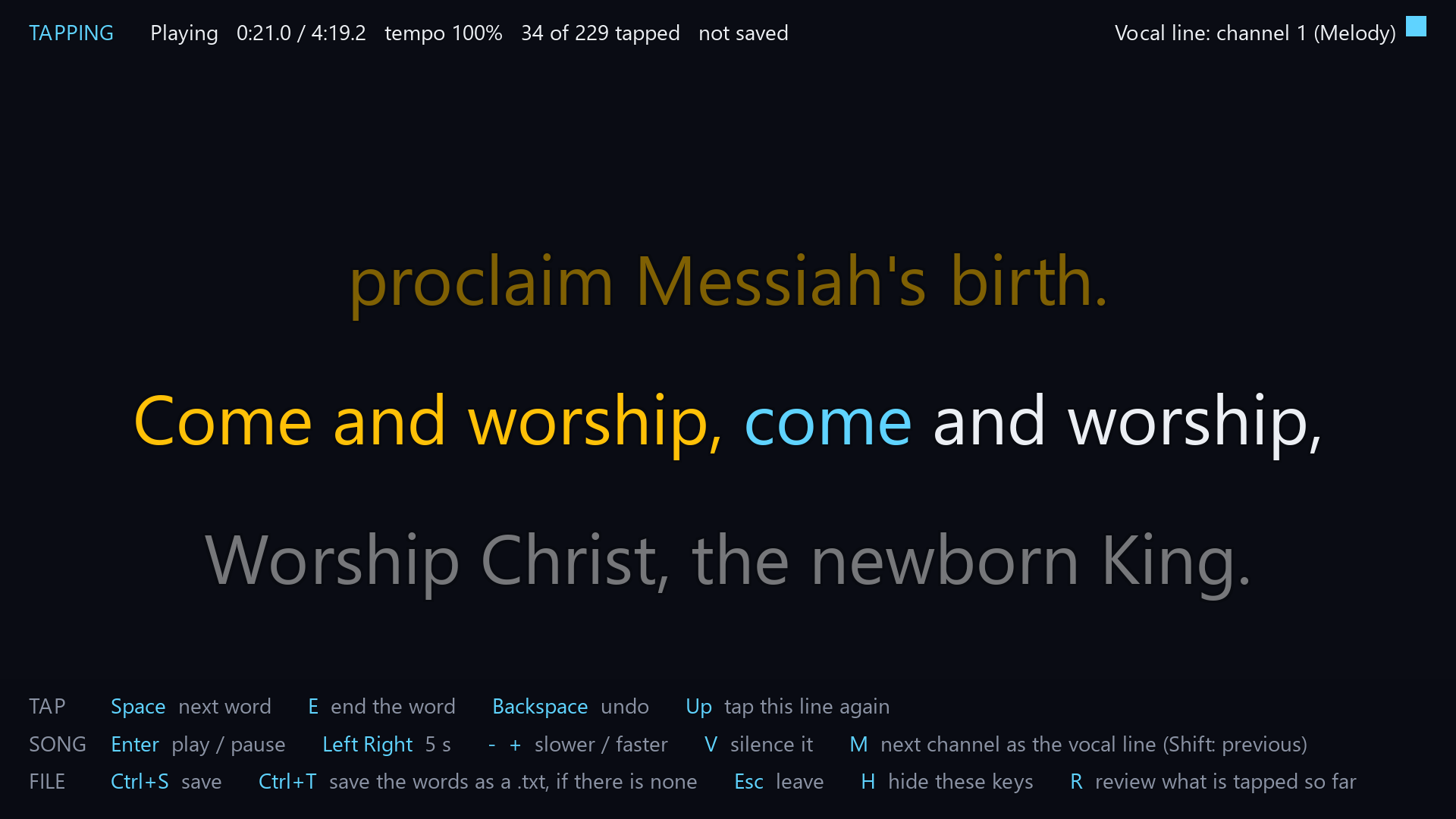 The lyric sync editor part-way through a carol: three lines of words, with the tapped
words of the middle line in yellow, the next word in blue and the rest in white, a status line that
reads Tapping, Playing, 34 of 229 tapped and not saved, the vocal line named as channel 1, and a
list of keys along the foot of the window